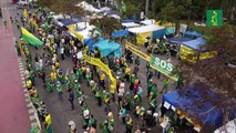 Convencidos de fraude electoral, bolsonaristas acampan ante cuarteles en Brasil