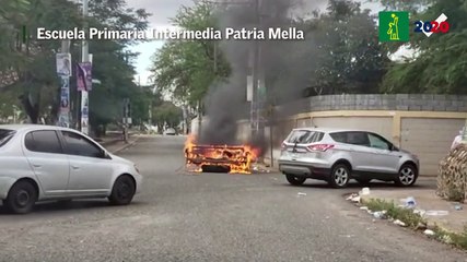 Quema de goma en la escuela electoral Primaria Intermedia Patria Mella