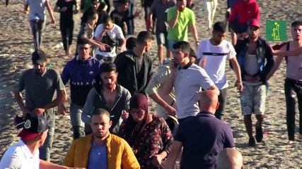 Llegan al enclave español de Ceuta un récord de 5.000 migrantes en un día.