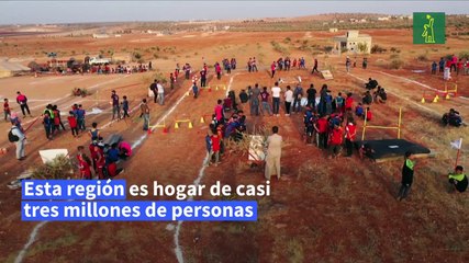 Niños disfrutan de "Juegos de los desplazados" en una Siria en guerra