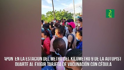 Tapón en la Estación del Metro del Kilómetro 9 de la autopista  Duarte al exigir tarjeta de vacunación con cédula