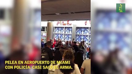 Pelea en Aeropuerto de Miami con policía. Casi sacó su arma.