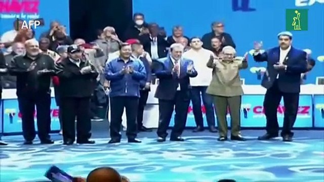 Él sigue en nosotros : seguidores de Chávez honran su memoria a 10 años de su muerte