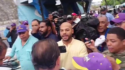 Abel Martínez y el PLD inician caravana en la capital en medio de la lluvia