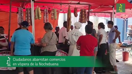 Ciudadanos abarrotan comercios en víspera de la Nochebuena