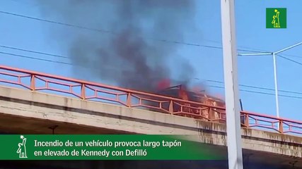Incendio de un vehículo provoca largo tapón en elevado de Kennedy con Defilló