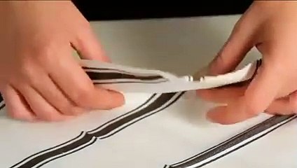 Réaliser facilement un pliage de serviette en forme de rouleau