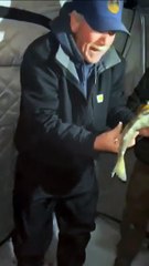 Man's Foot Gets Stuck in Ice Hole While Showing Off His Fish