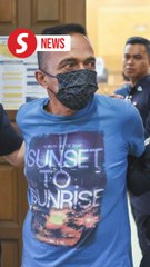 Man charged with murdering food trader
