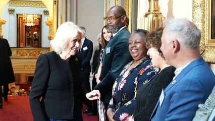 Queen surrounded by stars at young writers’ contest