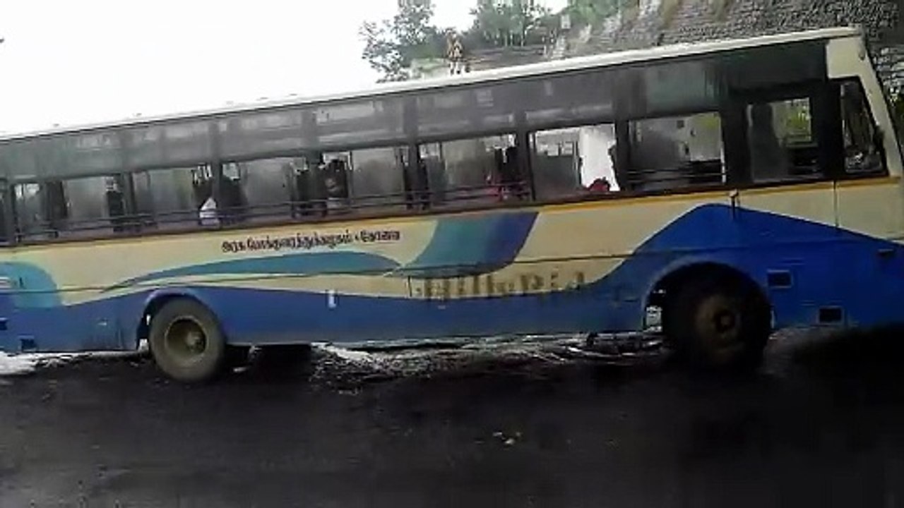 Experienced Dhimbam ghat bus driver patiently wait for struggling truck driver_Hills Driving