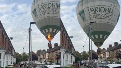 Bedford residents help hot air balloon land