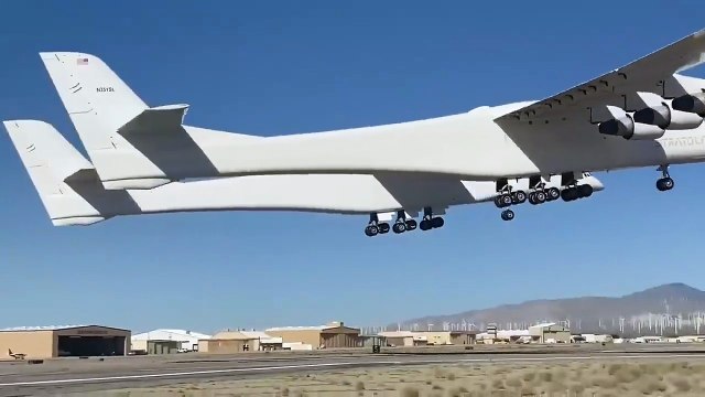 Takeoff and landing of the Stratolaunch Roc the largest all-composite plane ever built_ w_ wings lon