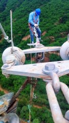 This Isn't a Tightrope Walker, It's His Job