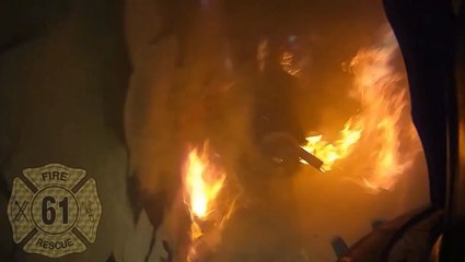 Firefighter falls 13ft through floor of burning building - but survives with no major injuries