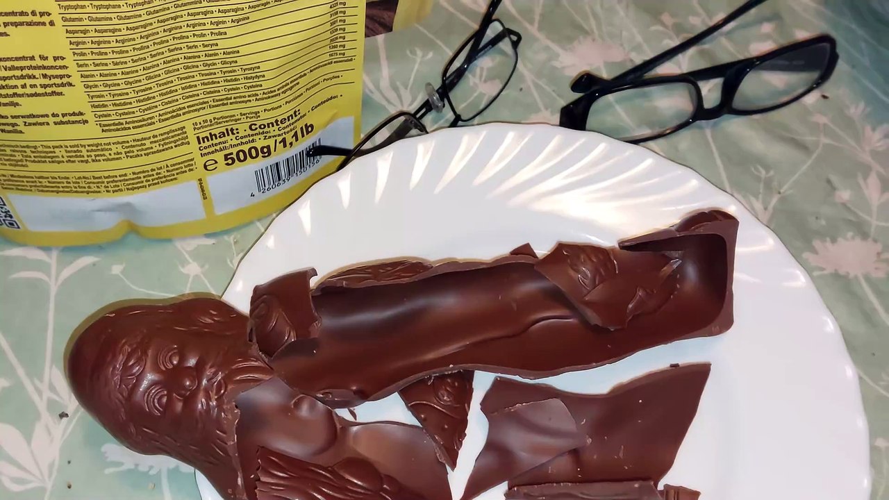 smashing a chocolate santa claus