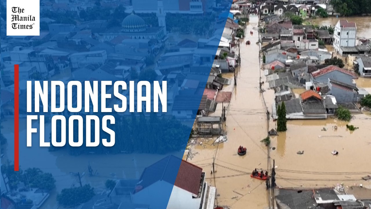 Displaced Indonesians stay in shelters after floods hit areas around capital
