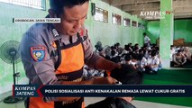 Polisi Sosialisasi Anti Kenakalan Remaja Lewat Cukur Gratis