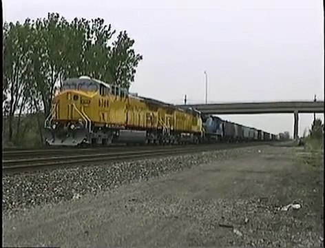 Conrail BUEL with new UP GE AC4400CW locomotives. Erie, PA . Date 5-23-96. Time 3_15 pm.