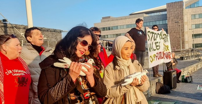 Pembrokeshire anti-space radar campaigners release peace doves at the Senedd