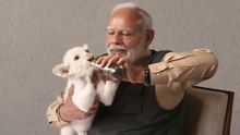 Prime Minister Modi with a Snow Leopard Cub