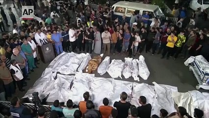 Bodies line up outside Gaza hospital as Israeli airstrikes continue