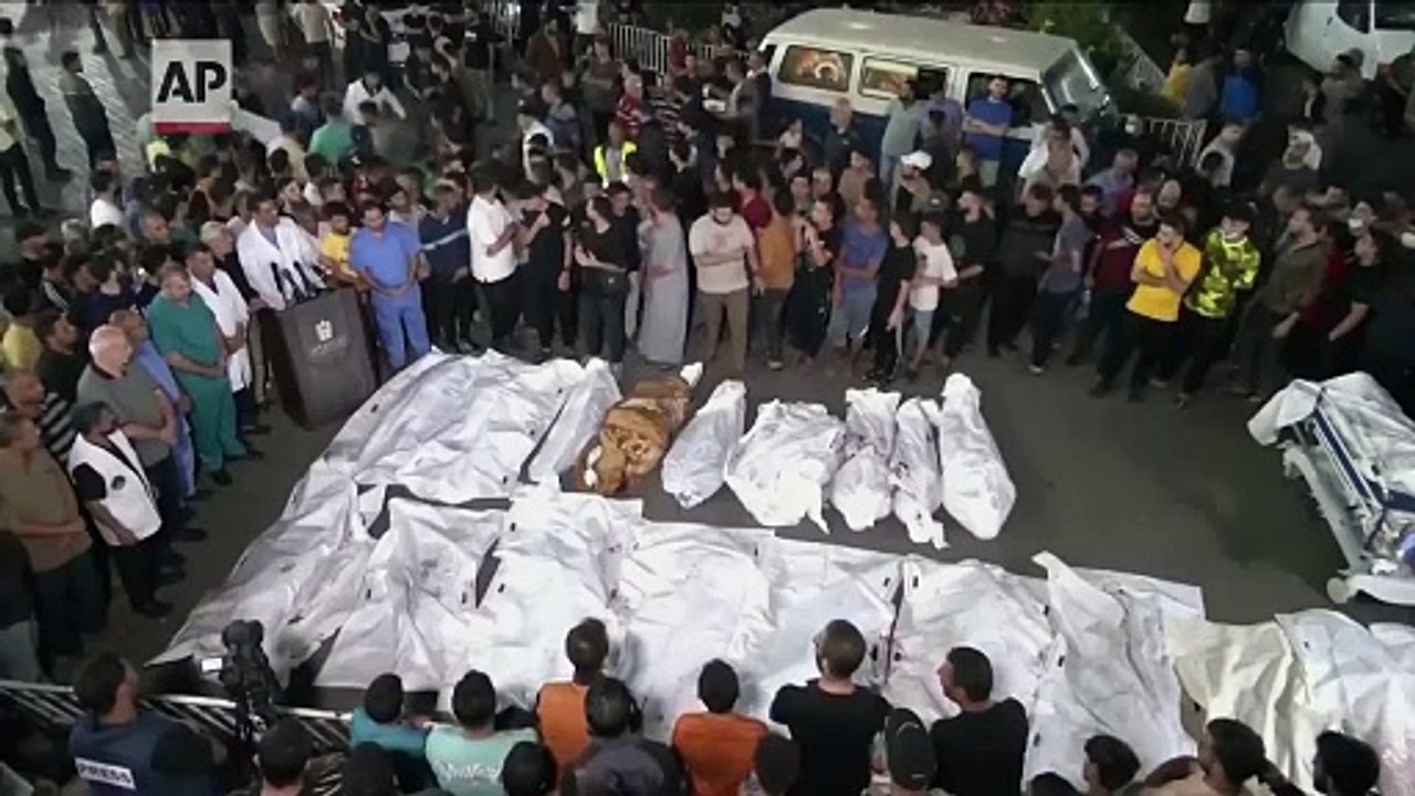 Bodies line up outside Gaza hospital as Israeli airstrikes continue
