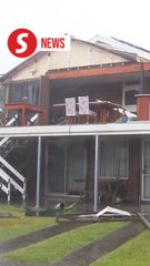 One dead, thousands without power as as ex-tropical cyclone lashes Australia east coast