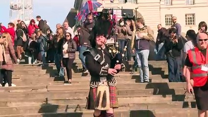 Bagpiper marks five years since Covid at memorial wall