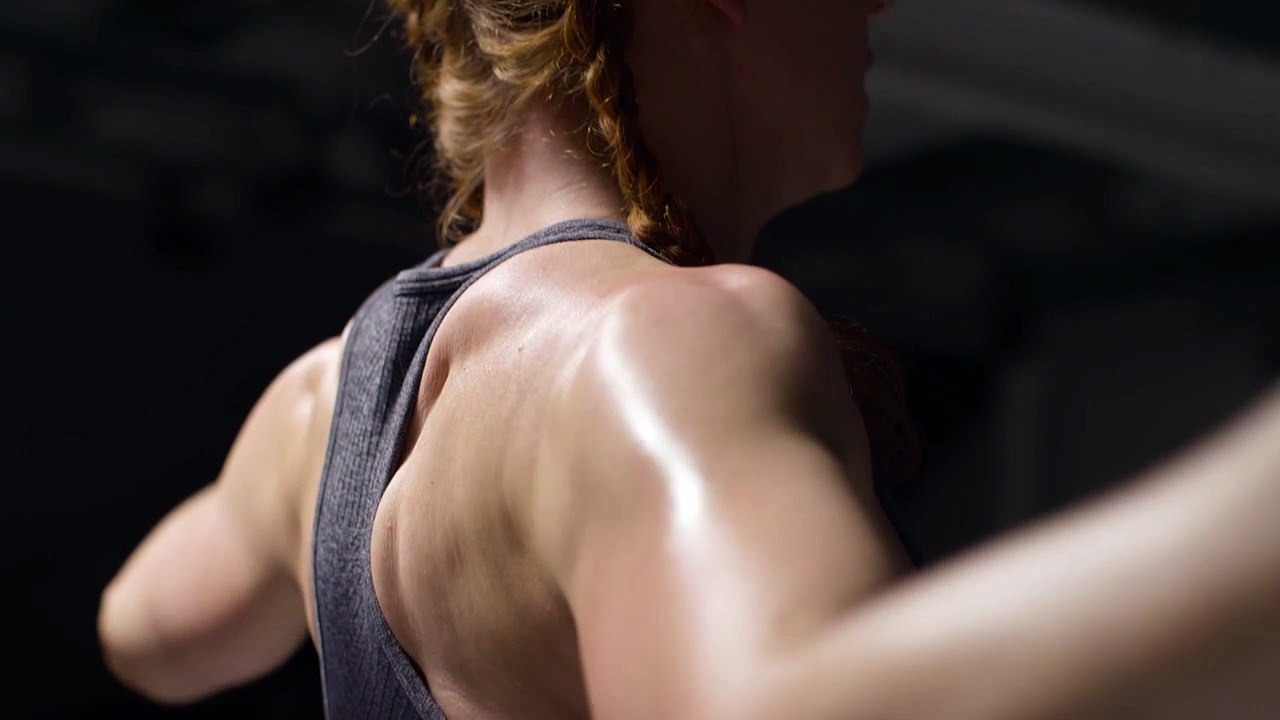 Close Up Studio Shot Showing Mature Woman Wearing Gym Fitness Clothing Doing Stretching Exercises 1