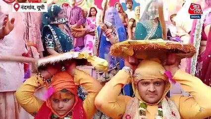 Lathmar Holi Celebration: नंदगांव में हुरियारों पर गोपियों ने बरसाए लट्ठ, देखिए तस्वीरें
