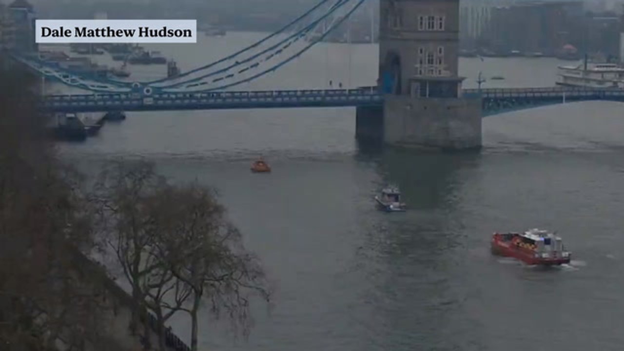 Tower Bridge shut down after man climbs onto railings