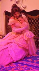 Little Girl Gets Hug from Belle