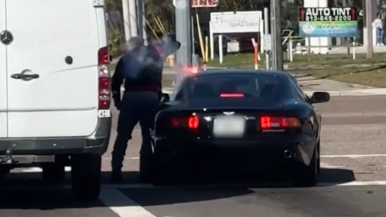 Road rage driver shot with flare gun after atta...