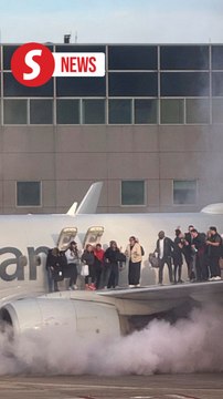 Passengers escape fiery American Airlines jet in Denver