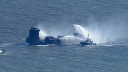 Aerials show fire and smoke from container ship Solong a day after North Sea collision with tanker