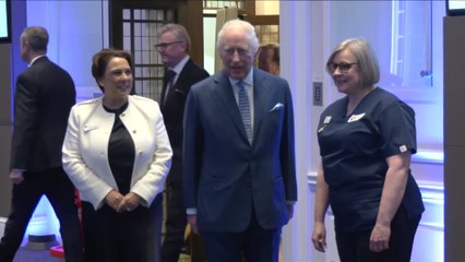 King Charles tests his CPR skills at London event