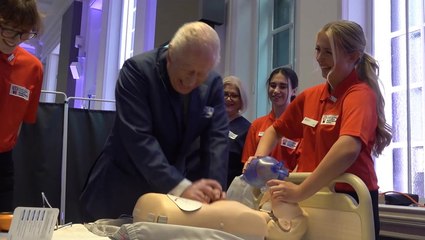 King Charles in hysterics as he practices CPR on dummy