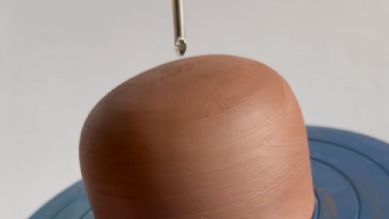 Ceramic wizardry unleashed as potter crafts a te-ruff-ic garden bell