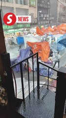 Severe downpour wreaks havoc and damaged tents of Ramadan bazaar traders on Jalan TAR