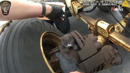 Lorry driver performing vehicle inspection suddenly calls emergency services