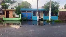 Residentes de la calle Penetración en Santo Domingo Norte enfrentan problemas por charco interminable