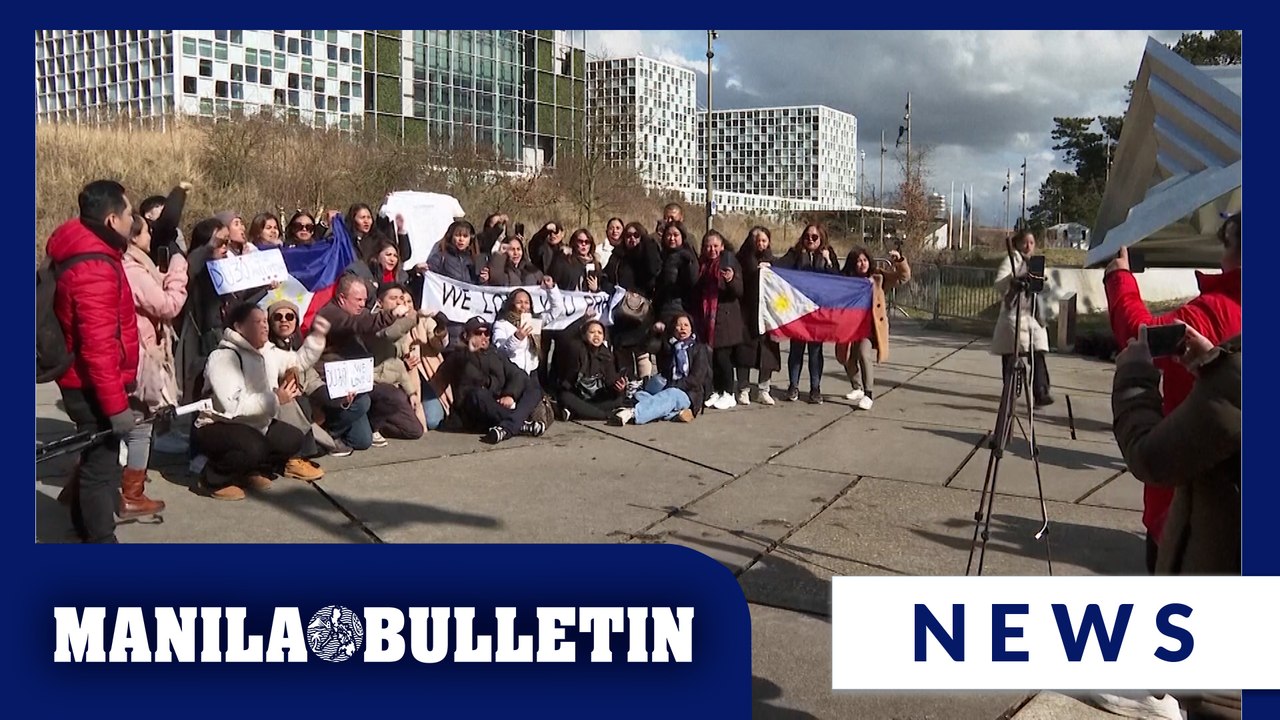 Protesters gather outside the ICC as Duterte faces murder charges