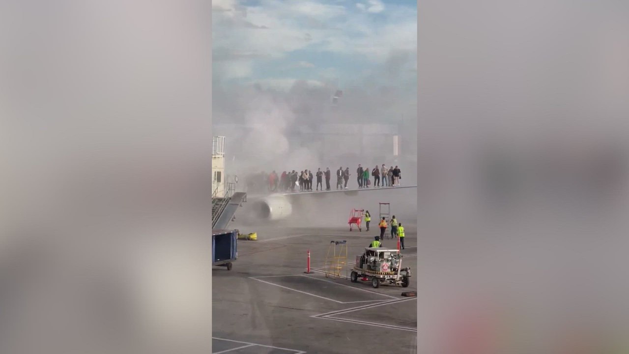 New footage revealed: passengers escape onto wing as American Airlines plane burns in Denver