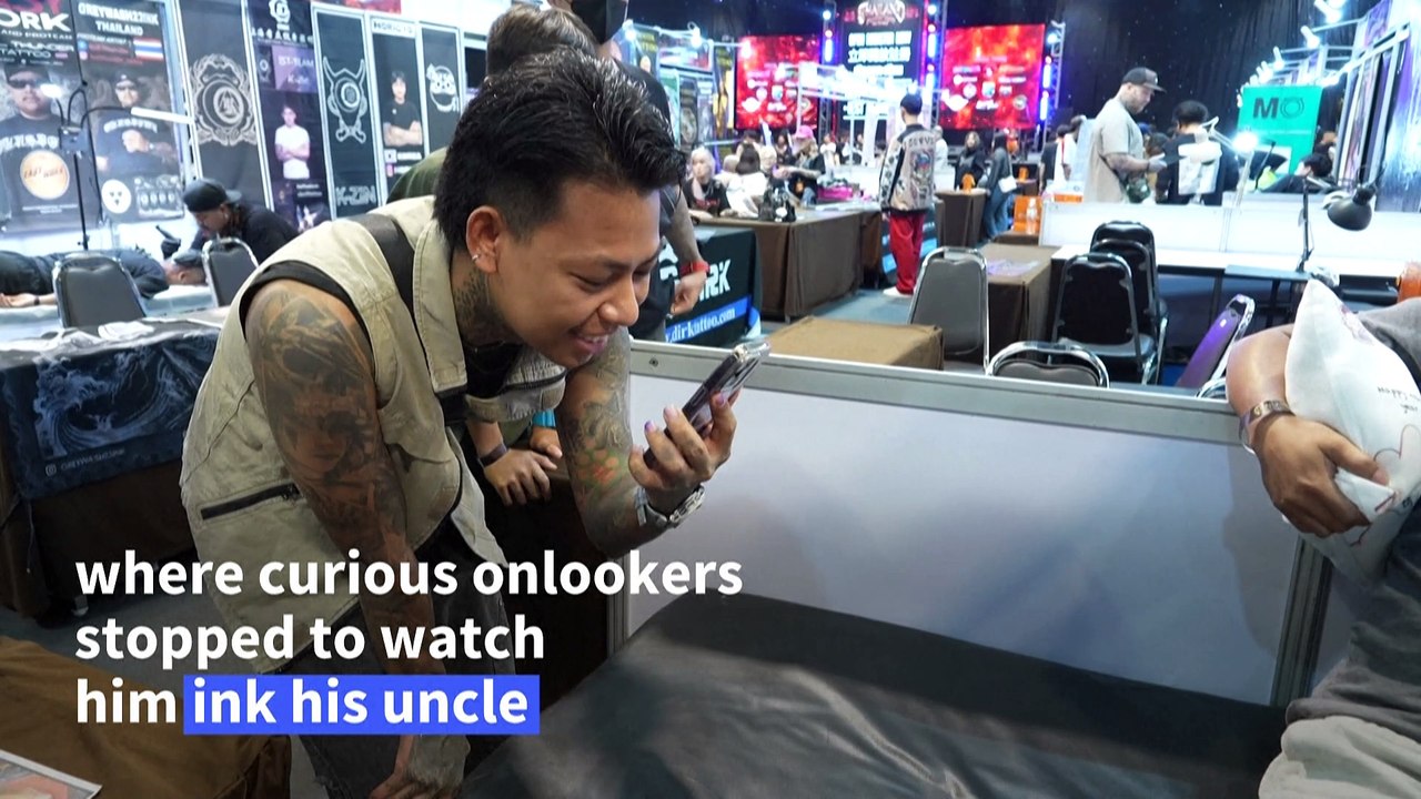Nine-year-old Thai tattooist makes his mark
