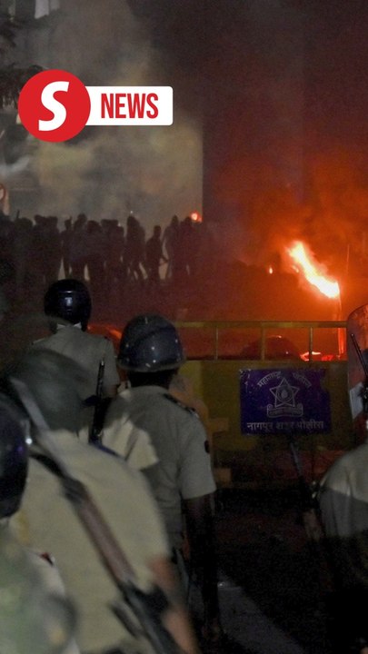 India orders curfew after violence over tomb of...