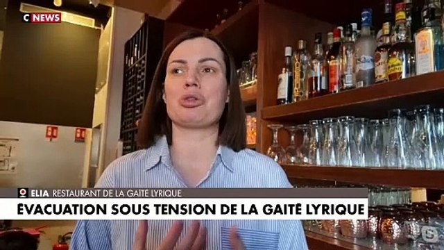 Elia, restauratrice dans le quartier de la Gaîté Lyrique, à Paris, se dit soulagée par l'évacuation des migrants