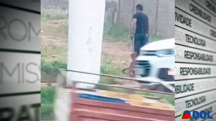 b'Homem arrasta e abandona co no Para1'