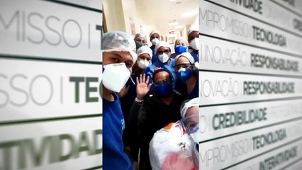 b'Profissionais da sabade da Policladnica celebram alta de pacientes'