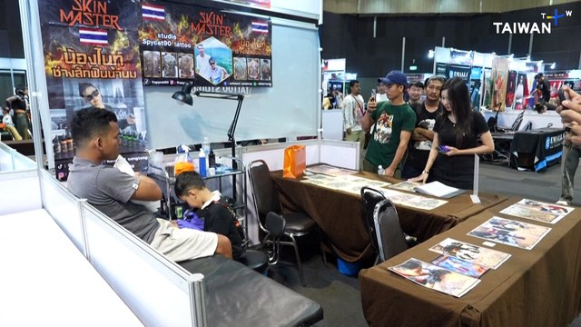 Nine-Year-Old Tattoo Artist Draws Crowds at Bangkok Expo